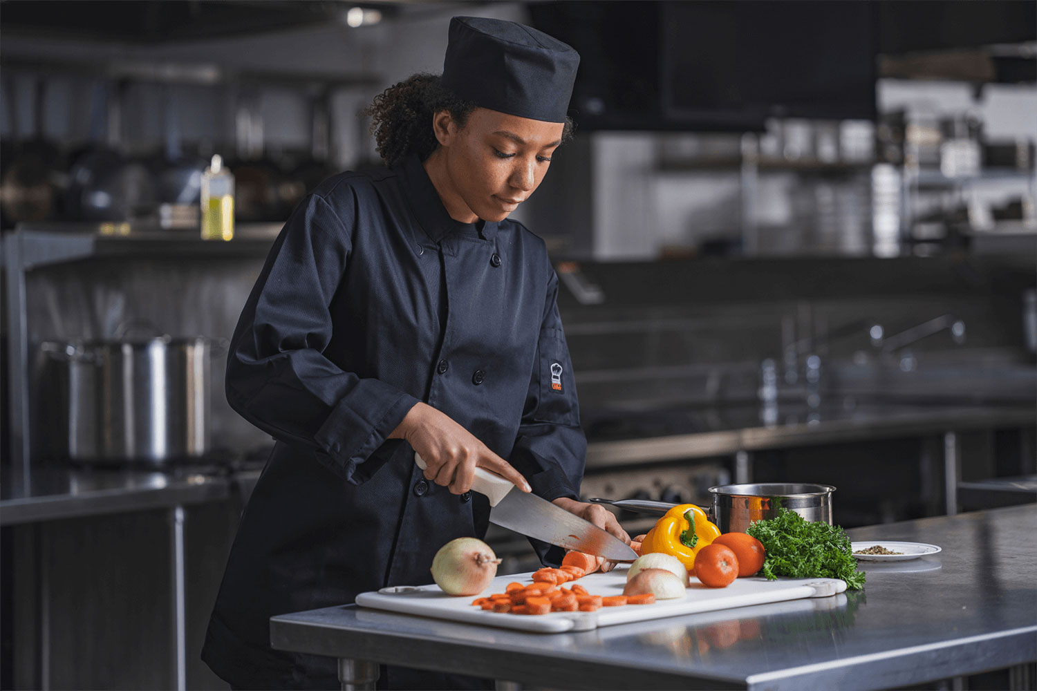 Woman chopping vegetables.